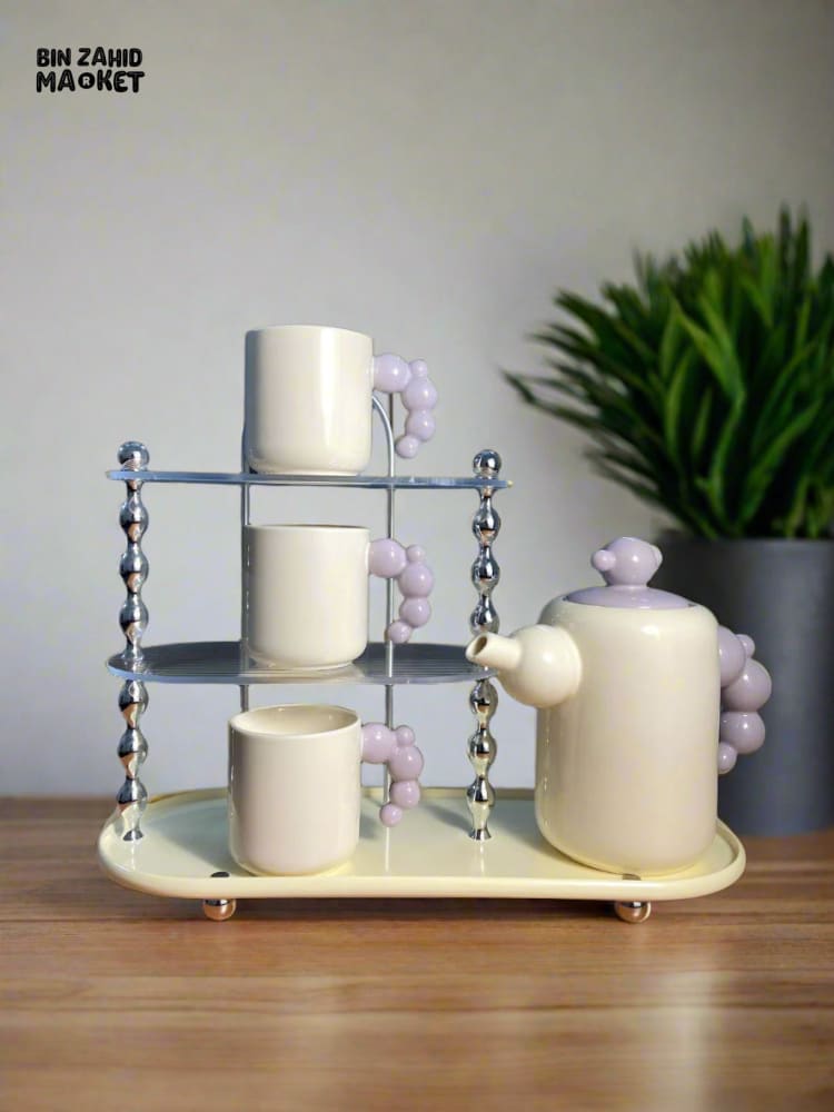 CREAM-STYLE CERAMIC TEA SET — ELEGANT TEAPOT AND CUPS WITH STYLISH RACK PERFECT FOR LIVING ROOM USE OR AS A HOUSEWARMING GIFT - PURPLE