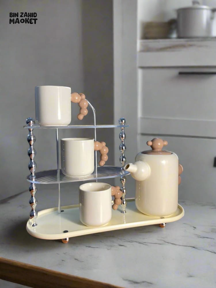 CREAM-STYLE CERAMIC TEA SET — ELEGANT TEAPOT AND CUPS WITH STYLISH RACK PERFECT FOR LIVING ROOM USE OR AS A HOUSEWARMING GIFT - BEIGE