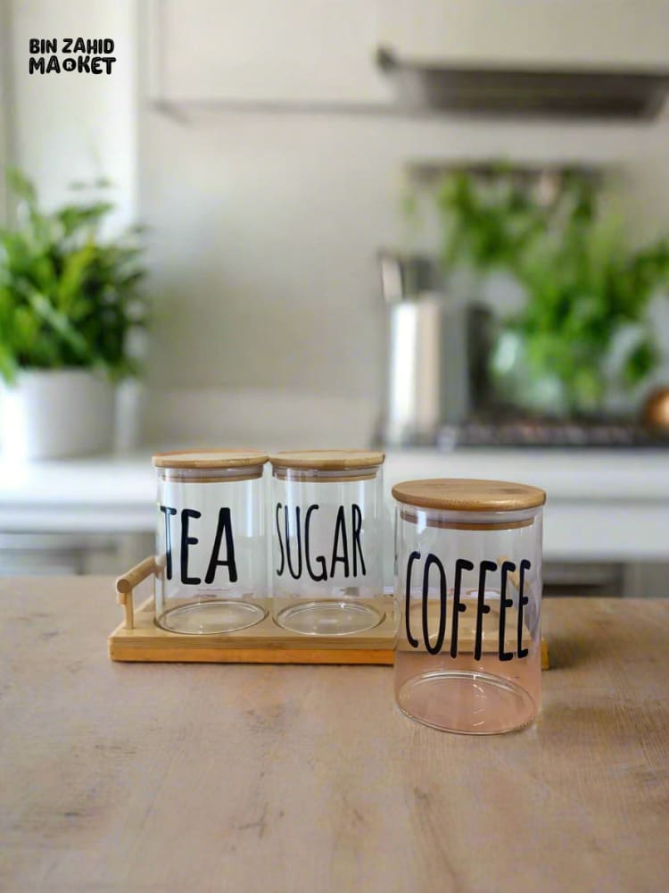 CLEAR GLASS JARS WITH BAMBOO LIDS LABELED FOR TEA SUGAR AND COFFEE — PERFECT FOR AN ORGANIZED AND MODERN KITCHEN LOOK - ROUND SHAPE