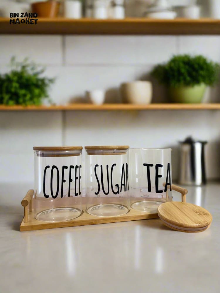 CLEAR GLASS JARS WITH BAMBOO LIDS LABELED FOR TEA SUGAR AND COFFEE — PERFECT FOR AN ORGANIZED AND MODERN KITCHEN LOOK - ROUND SHAPE