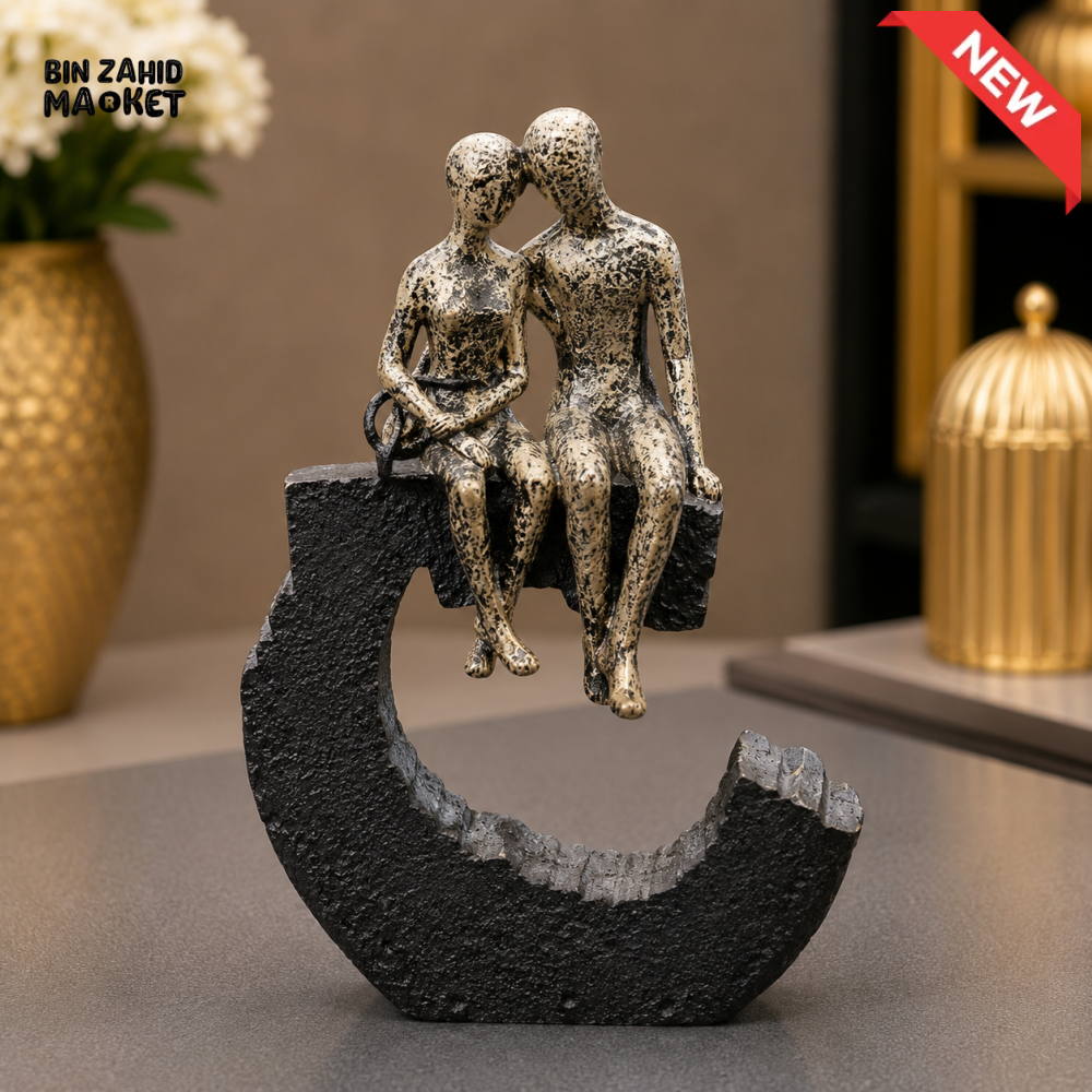 ANTIQUE GOLD COUPLE ON CRESCENT DECORATIVE SCULPTURE