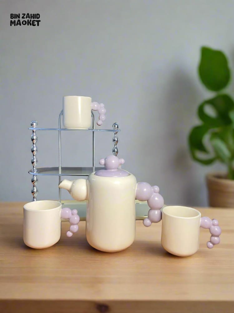 CREAM-STYLE CERAMIC TEA SET — ELEGANT TEAPOT AND CUPS WITH STYLISH RACK PERFECT FOR LIVING ROOM USE OR AS A HOUSEWARMING GIFT - PURPLE