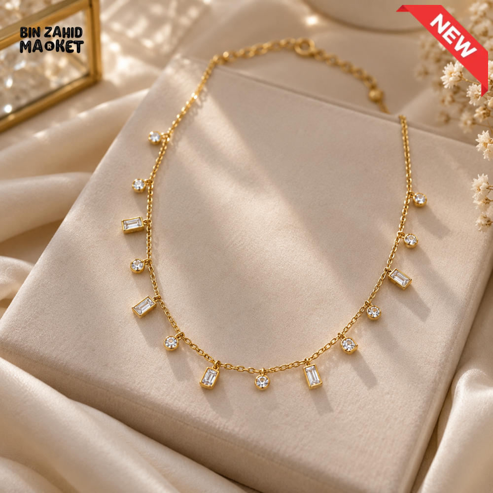 BZM JEWELS GOLD-TONE BAGUETTE AND ROUND CRYSTAL CHARM NECKLACE