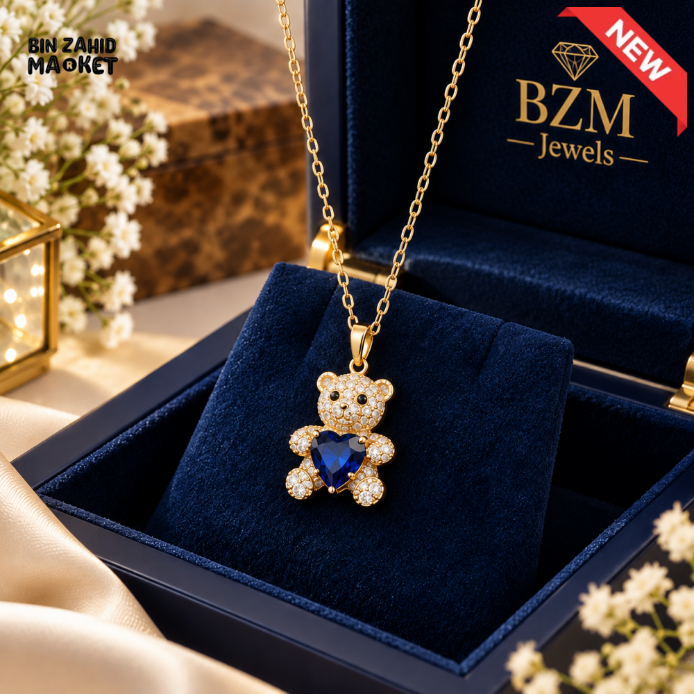 BZM JEWELS GOLD-TONE CRYSTAL TEDDY BEAR PENDANT NECKLACE WITH BLUE HEART STONE