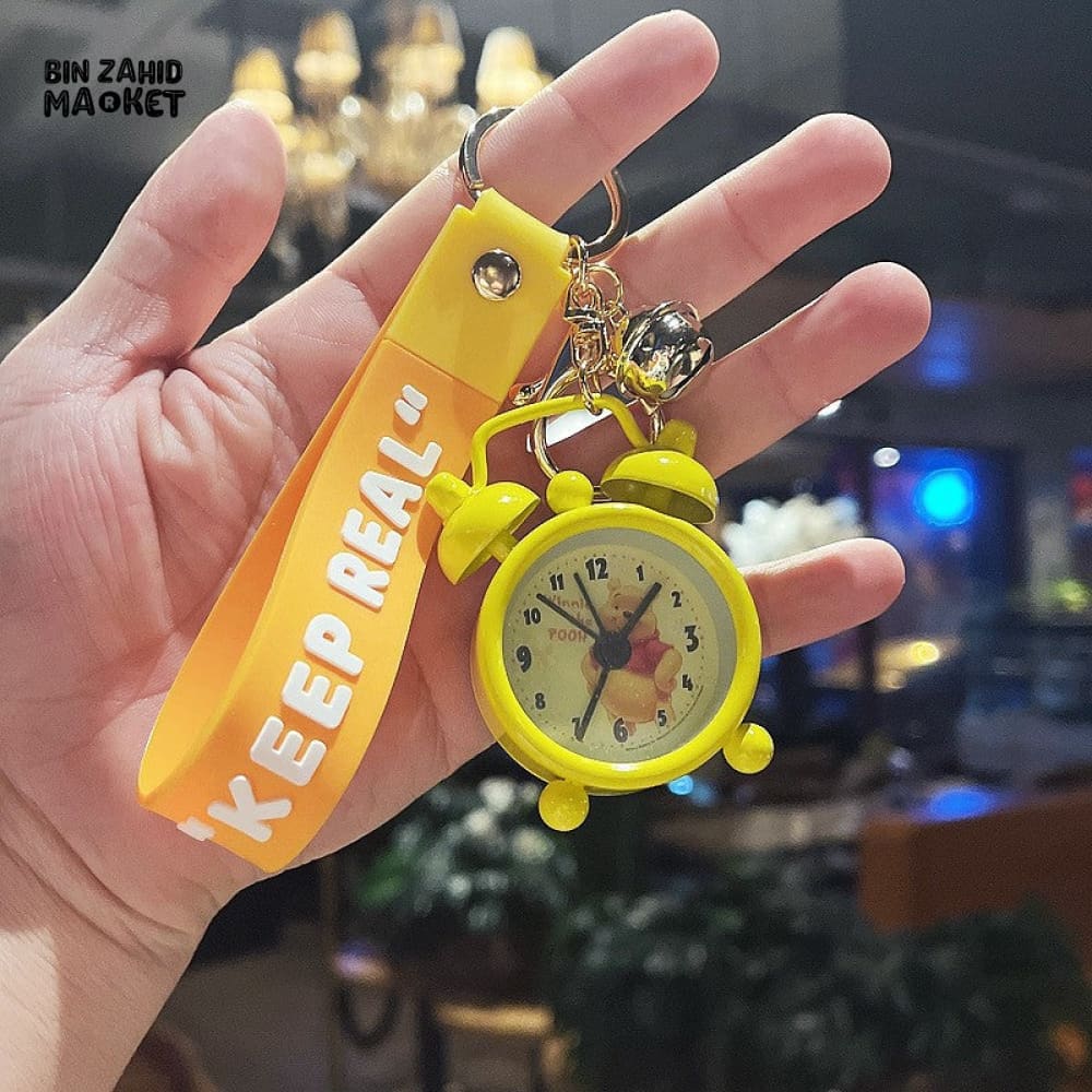 COLORFUL MINI ALARM CLOCK KEYCHAIN WITH "KEEP REAL" STRAP – CUTE CARTOON DESIGN ACCESSORY