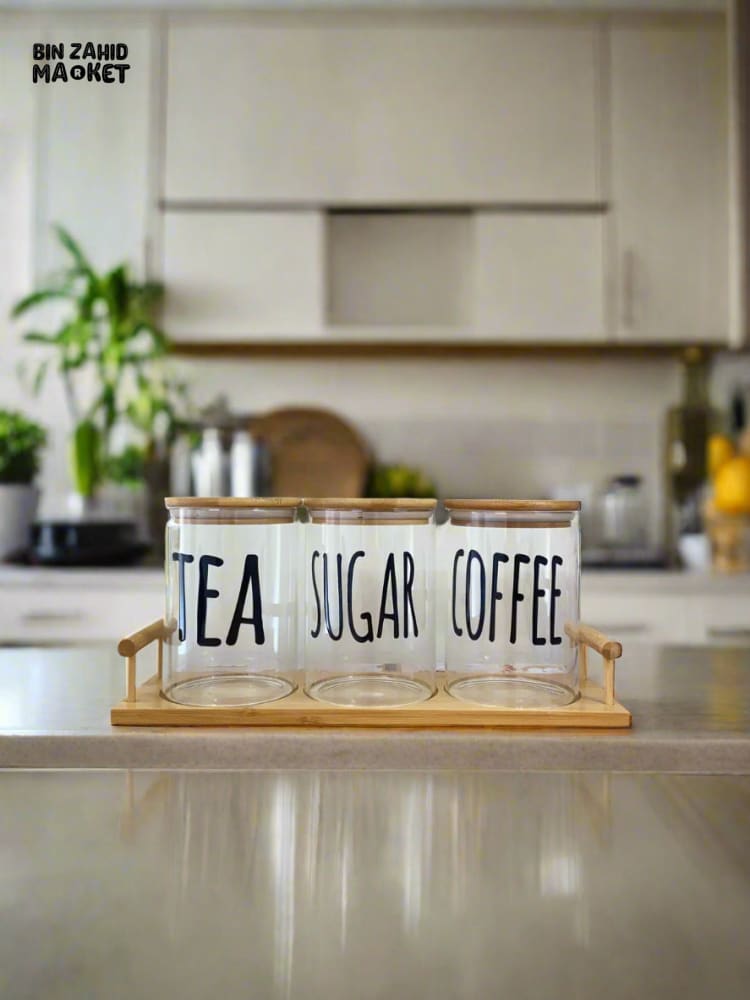 CLEAR GLASS JARS WITH BAMBOO LIDS LABELED FOR TEA SUGAR AND COFFEE — PERFECT FOR AN ORGANIZED AND MODERN KITCHEN LOOK - ROUND SHAPE