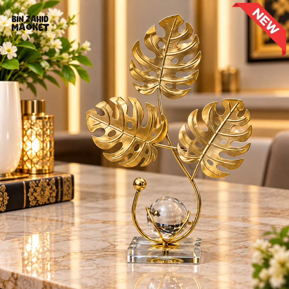 GOLDEN MONSTERA LEAF & CRYSTAL BALL DECORATIVE SCULPTURE - Sculptures