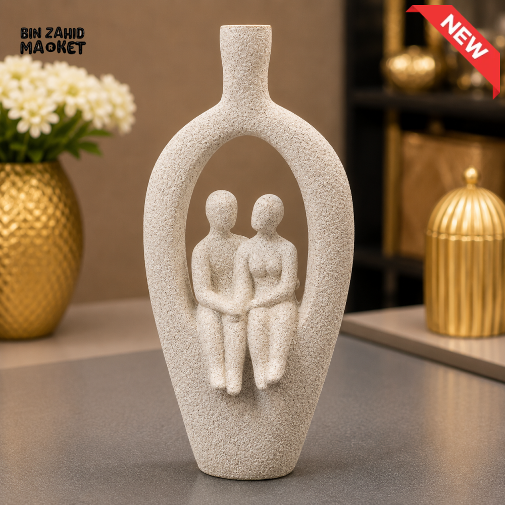 IVORY COUPLE IN HOLLOW FRAME DECORATIVE SCULPTURE