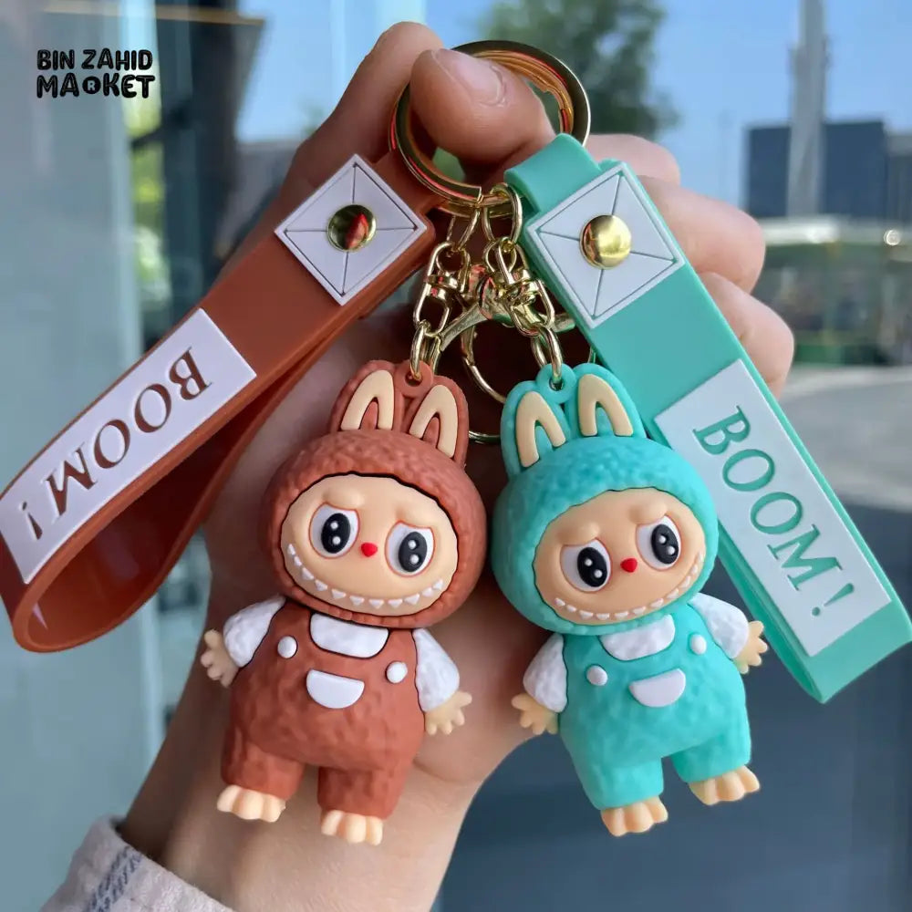 LABUBU CARTOON KEYCHAIN – CUTE PENDANT WITH WRIST STRAP TRENDY BAG CHARM & SMALL GIFT ACCESSORY