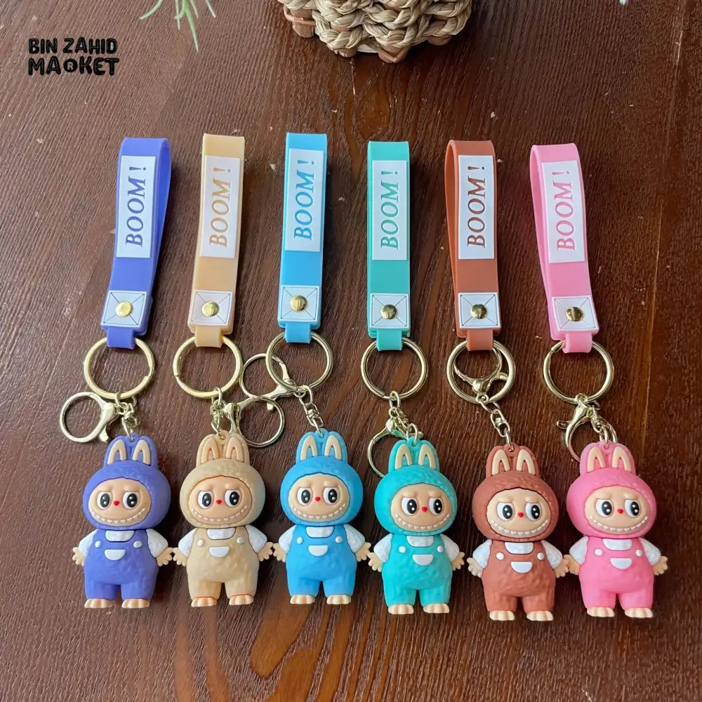 LABUBU CARTOON KEYCHAIN – CUTE PENDANT WITH WRIST STRAP TRENDY BAG CHARM & SMALL GIFT ACCESSORY