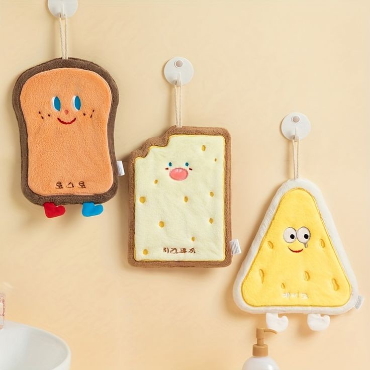 CARTOON CHARACTERS HANGING TOWELS