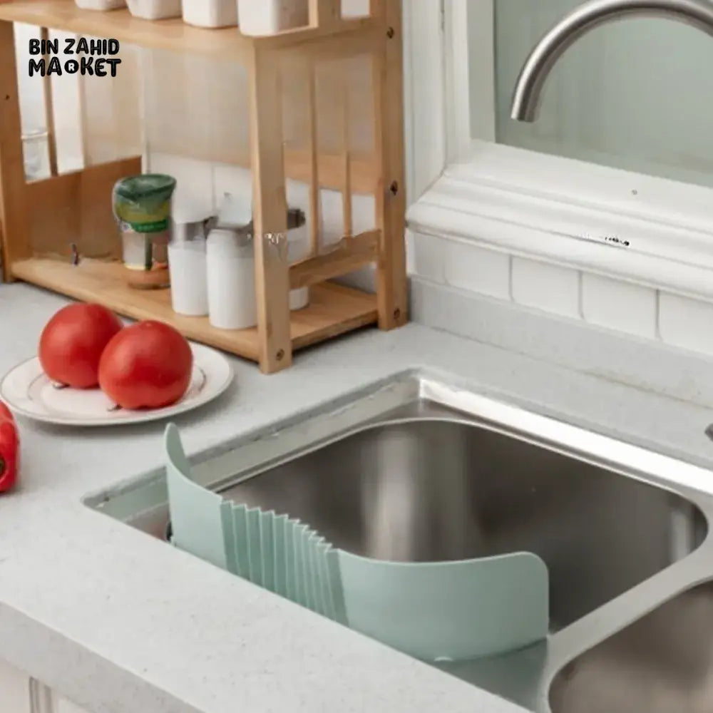 ADJUSTABLE KITCHEN SINK SPLASH GUARD