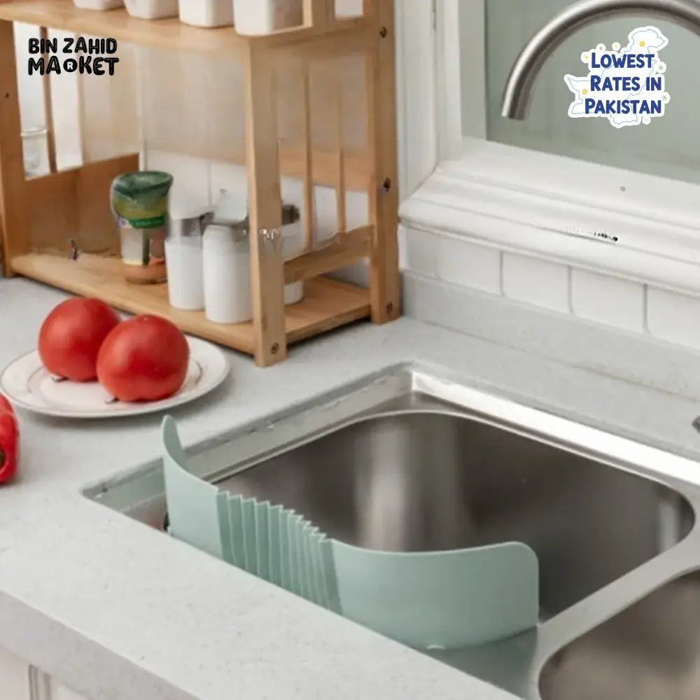 ADJUSTABLE KITCHEN SINK SPLASH GUARD