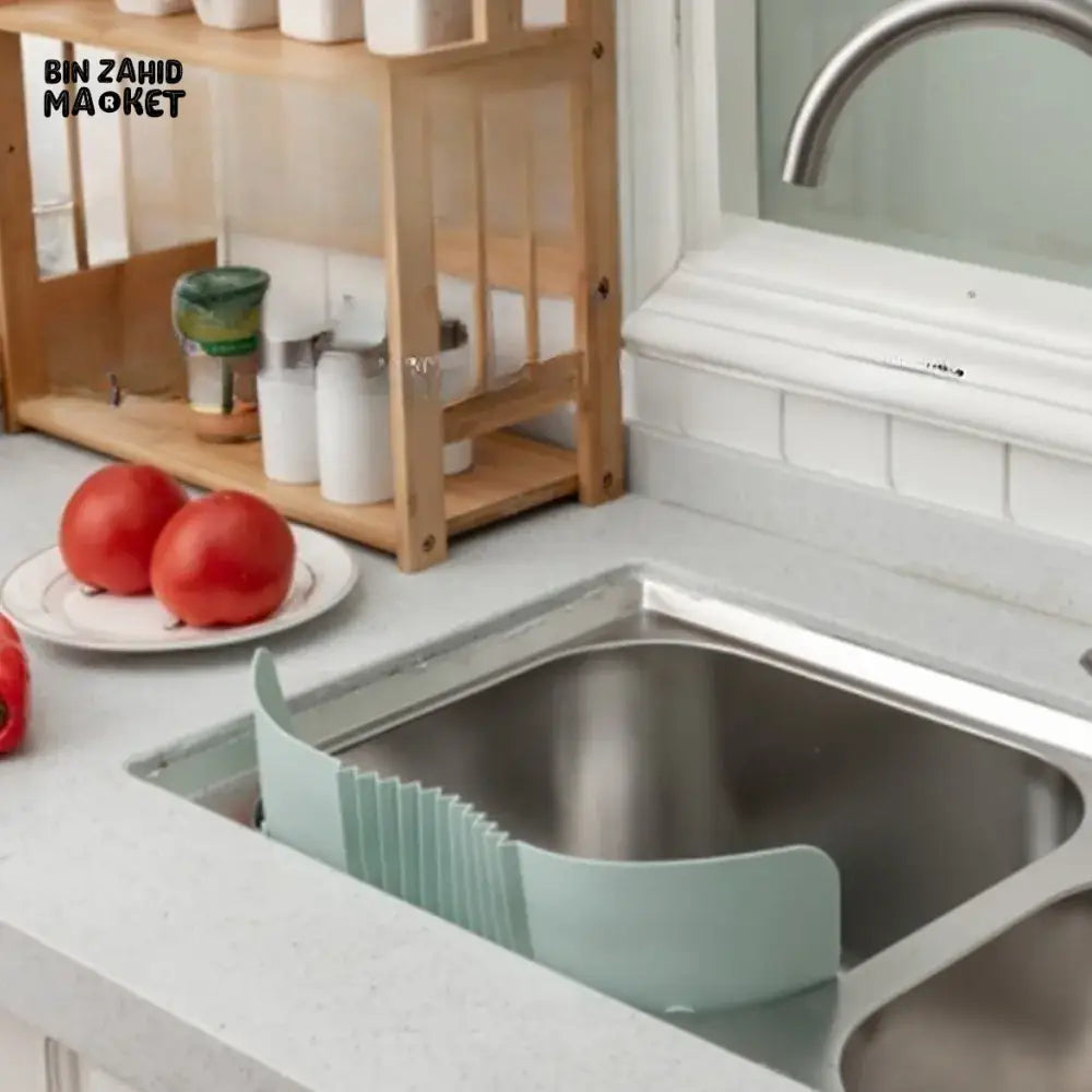 ADJUSTABLE KITCHEN SINK SPLASH GUARD