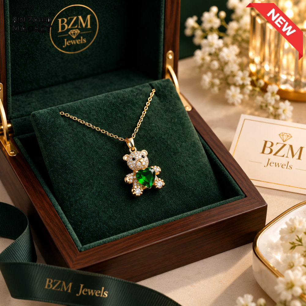 BZM JEWELS GOLD-TONE CRYSTAL TEDDY BEAR PENDANT NECKLACE WITH GREEN HEART STONE