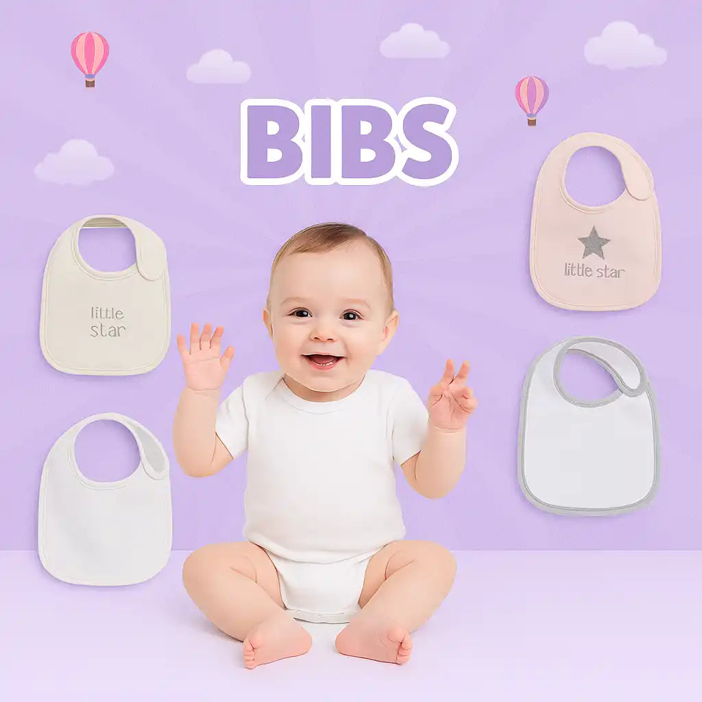 A collection of baby bibs in various neutral colors.