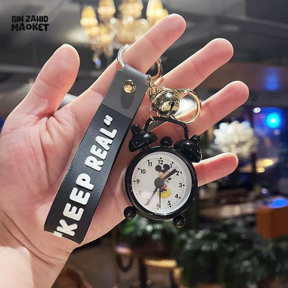 COLORFUL MINI ALARM CLOCK KEYCHAIN WITH "KEEP REAL" STRAP – CUTE CARTOON DESIGN ACCESSORY