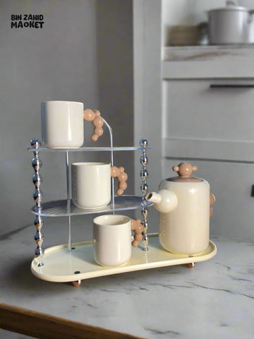 CREAM-STYLE CERAMIC TEA SET — ELEGANT TEAPOT AND CUPS WITH STYLISH RACK PERFECT FOR LIVING ROOM USE OR AS A HOUSEWARMING GIFT - BEIGE