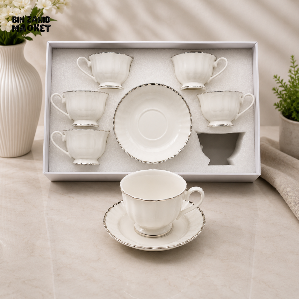 FLUTED WHITE PORCELAIN TEA CUP AND SAUCER SET WITH SILVER TRIM