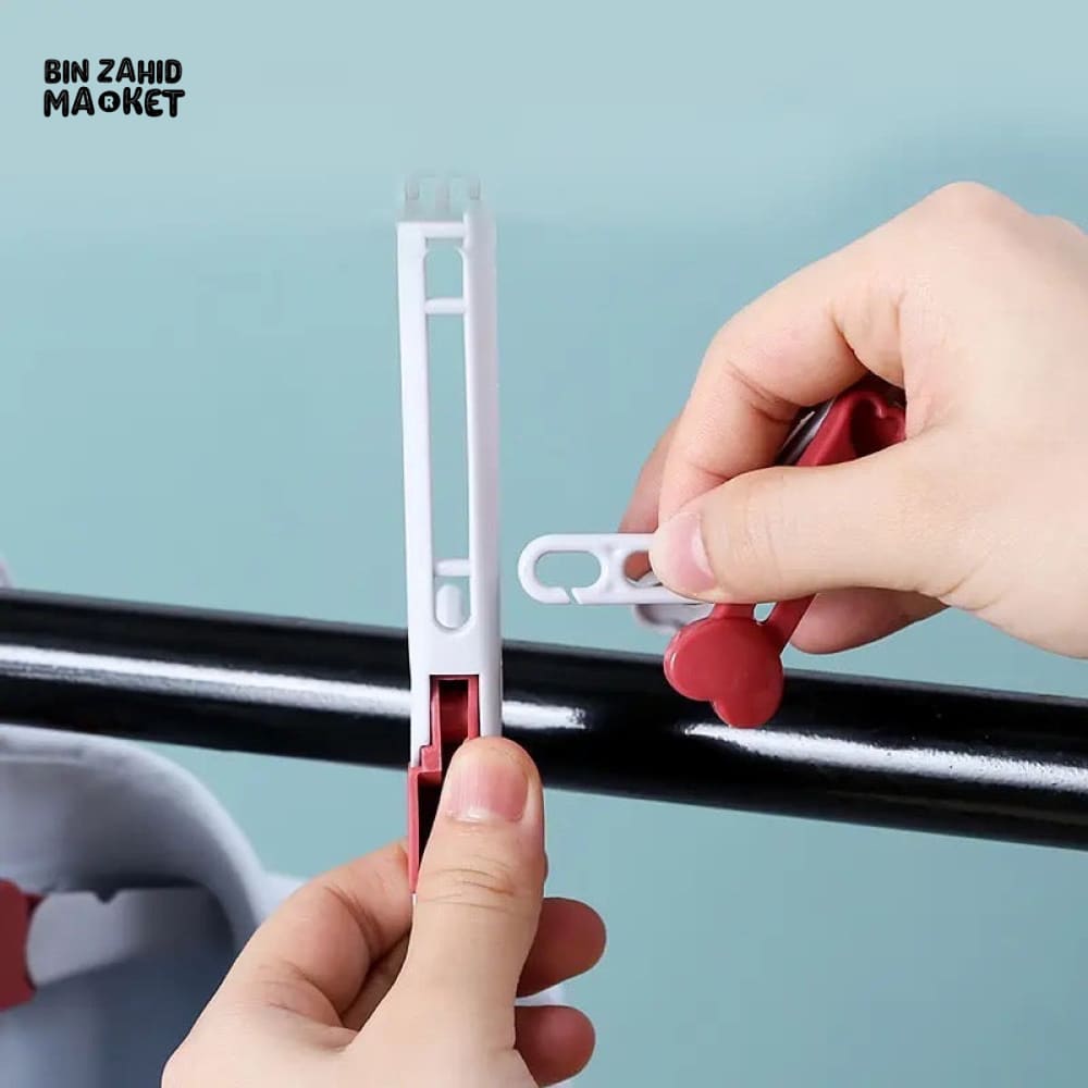 FOLDING WIND-PROOF CLOTH HANGER