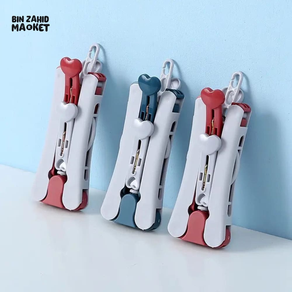 FOLDING WIND-PROOF CLOTH HANGER
