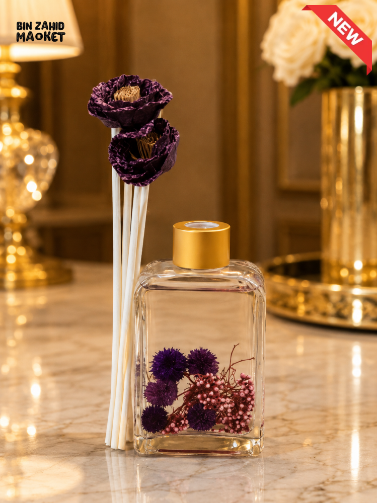 GLASS FLORAL REED DIFFUSER WITH DECORATIVE FLOWERS