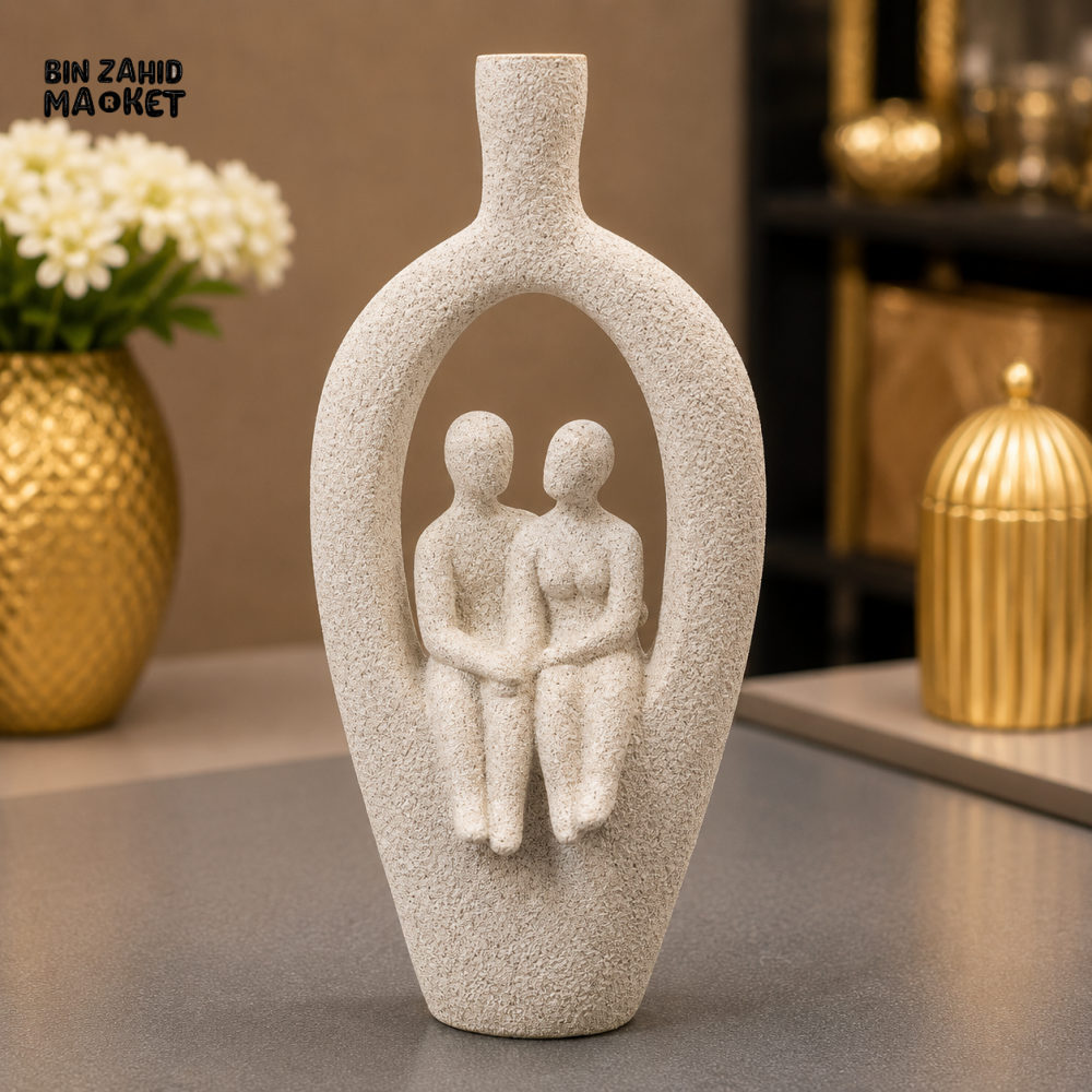 IVORY COUPLE IN HOLLOW FRAME DECORATIVE SCULPTURE