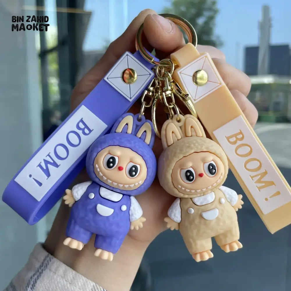 LABUBU CARTOON KEYCHAIN – CUTE PENDANT WITH WRIST STRAP TRENDY BAG CHARM & SMALL GIFT ACCESSORY