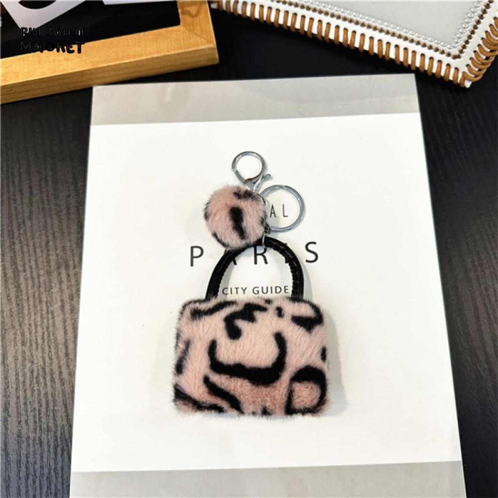 LEOPARD PATTERN BAG KEYCHAIN WITH FLUFFY BEAD — BACKPACK PHONE & CAR ACCESSORY