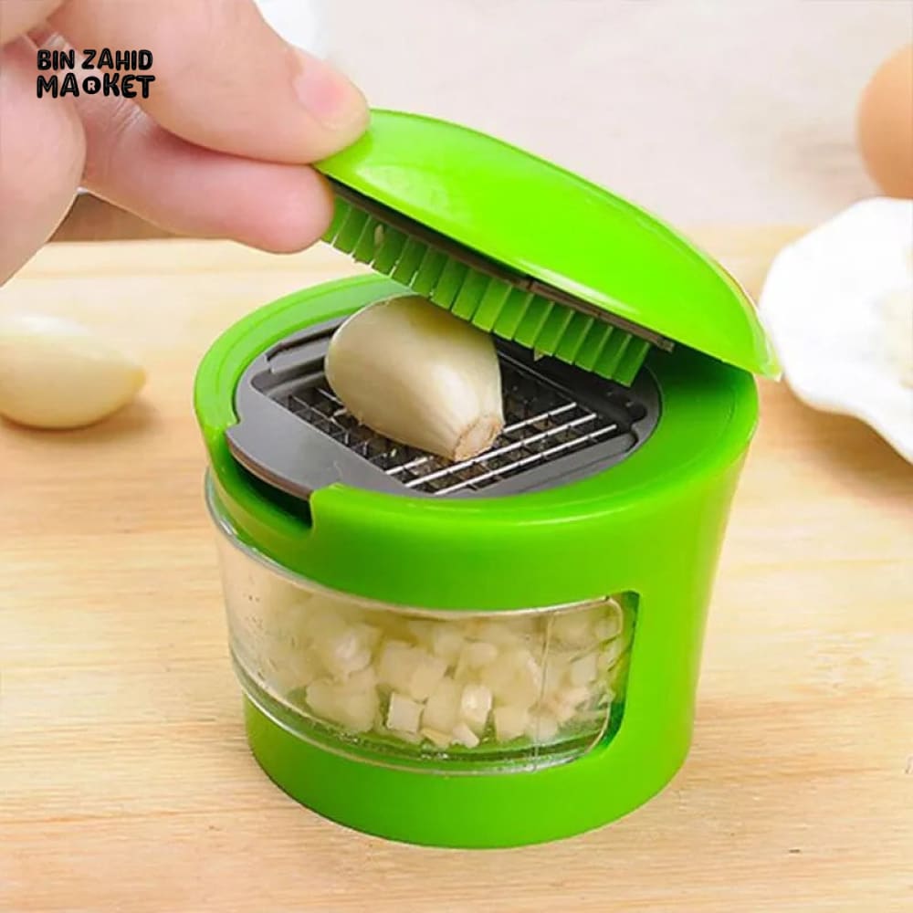 MINI GARLIC PRESSER