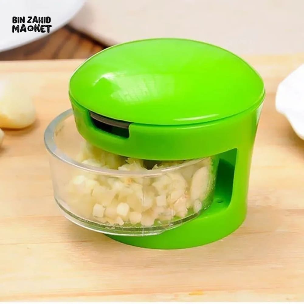 MINI GARLIC PRESSER