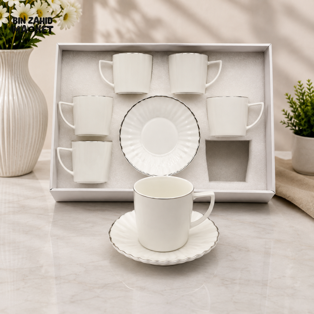 MODERN WHITE PORCELAIN TEA CUP AND SAUCER SET WITH SILVER TRIM