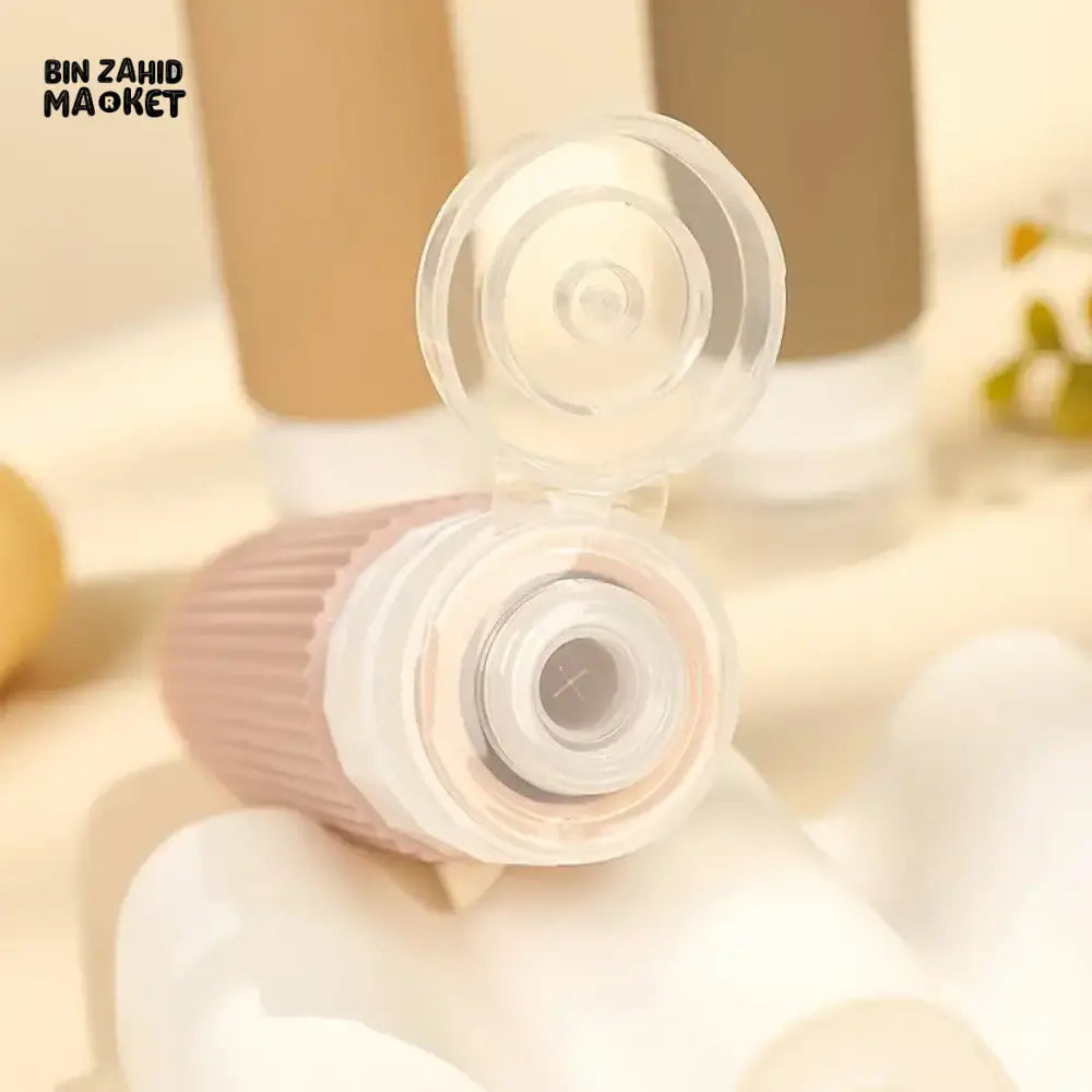 PACK OF 4 SILICONE TRAVEL BOTTLES PORTABLE BPA FREE LEAK PROOF CONTAINERS