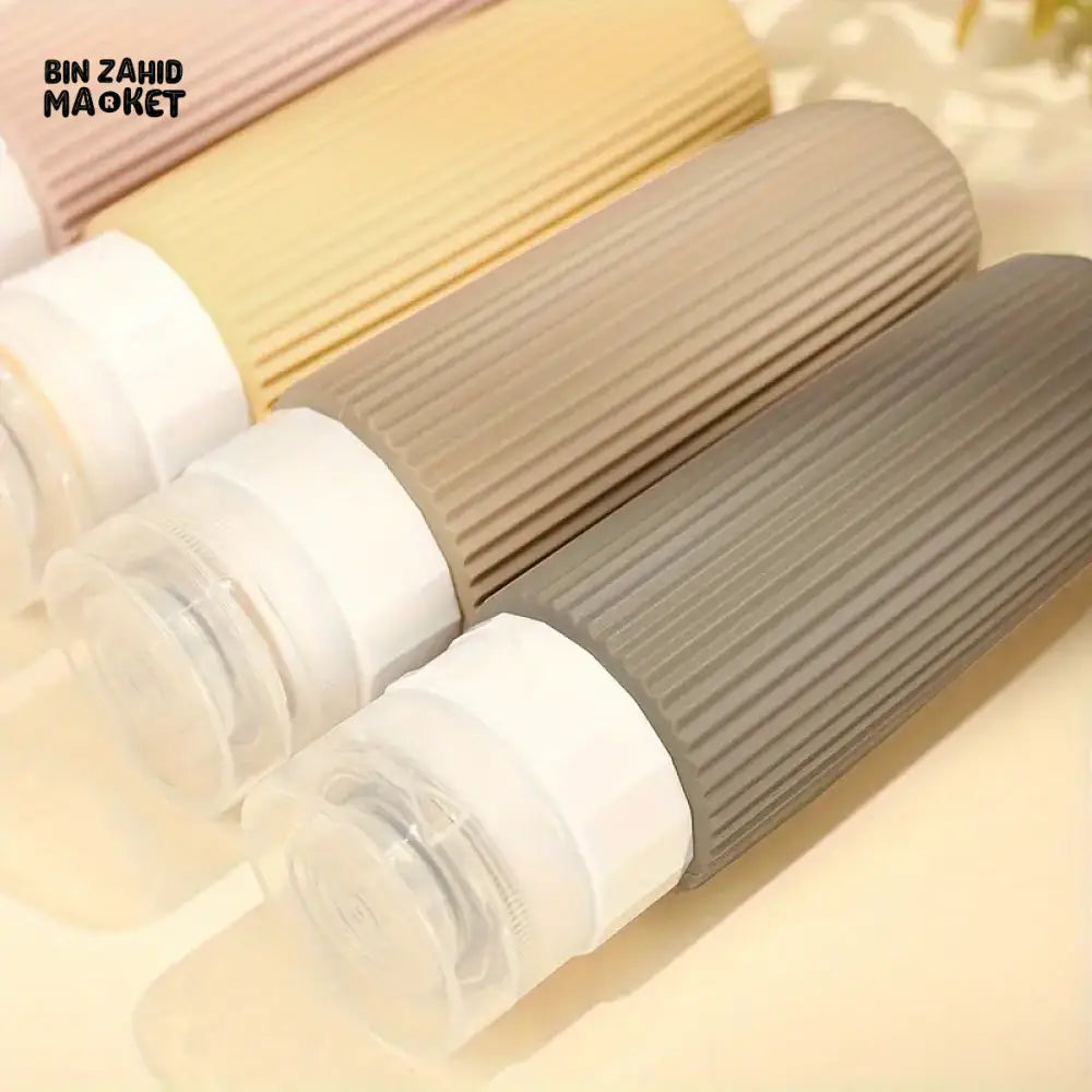 PACK OF 4 SILICONE TRAVEL BOTTLES PORTABLE BPA FREE LEAK PROOF CONTAINERS