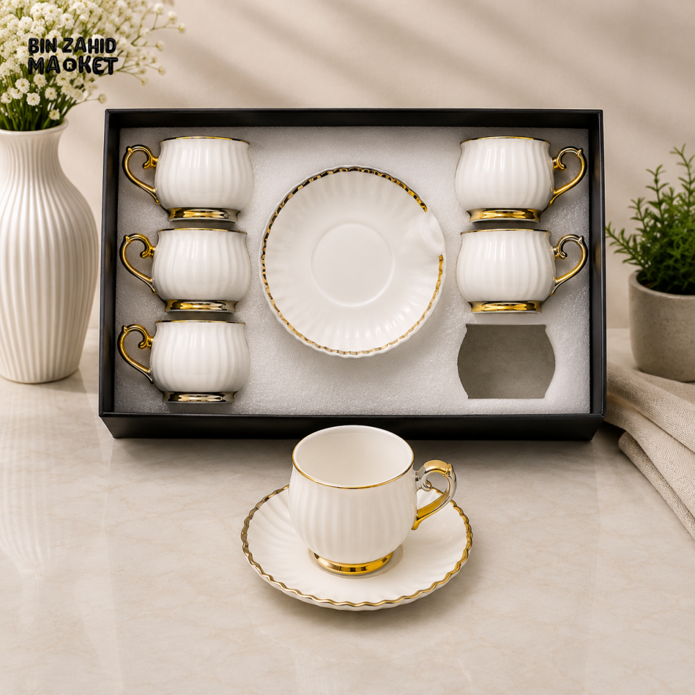 RIBBED WHITE PORCELAIN TEA CUP AND SAUCER SET WITH GOLD TRIM