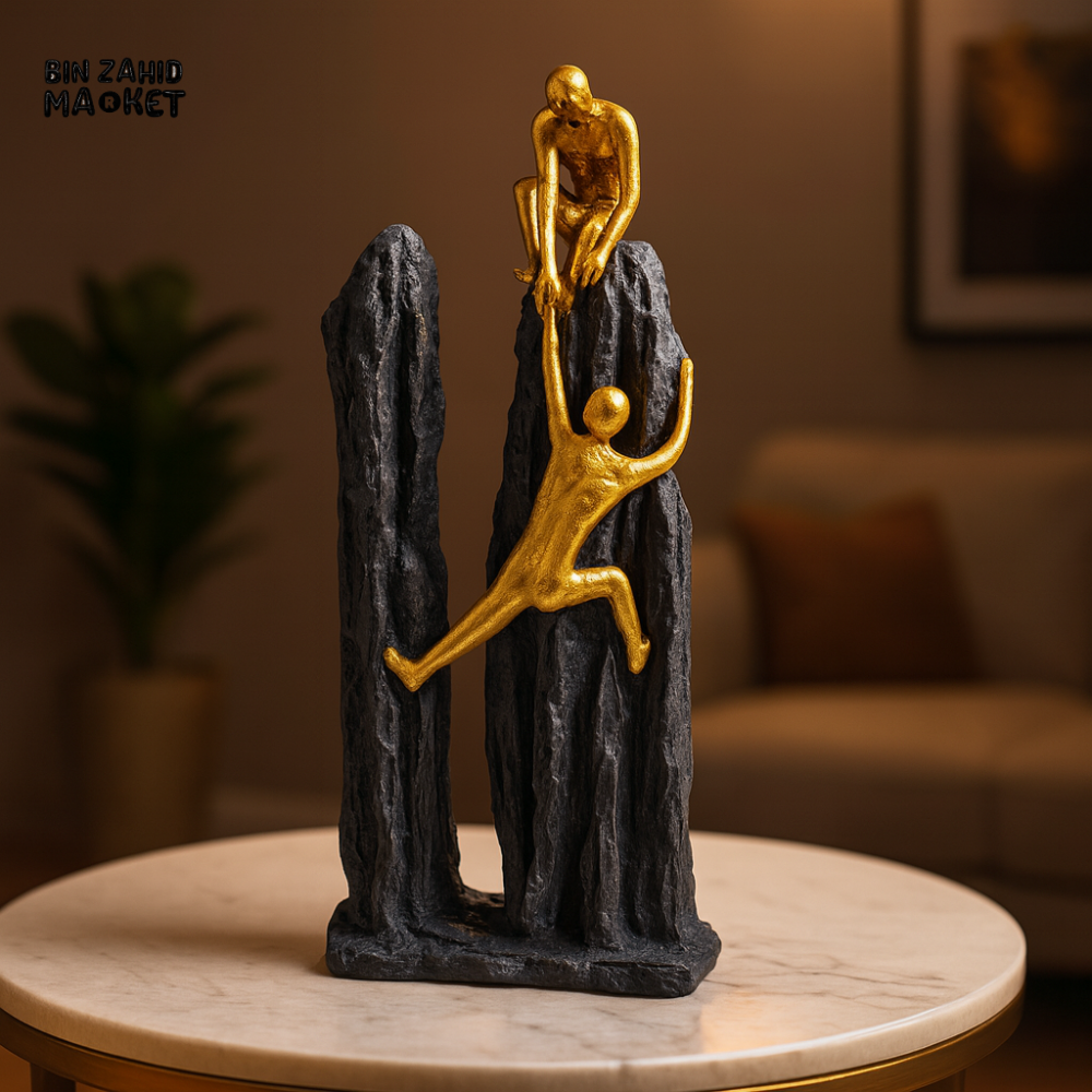 TEAMWORK GOLD FIGURINE – CLIMBING ON BLACK ROCK STATUE
