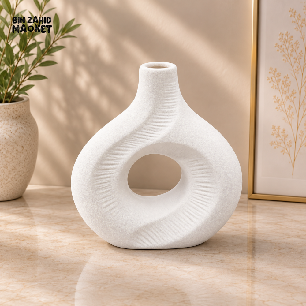 TEXTURED HOLLOW ROUND CERAMIC DECORATIVE VASE