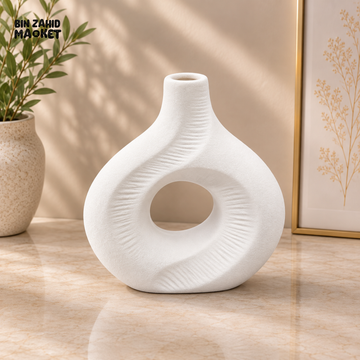 TEXTURED HOLLOW ROUND CERAMIC DECORATIVE VASE