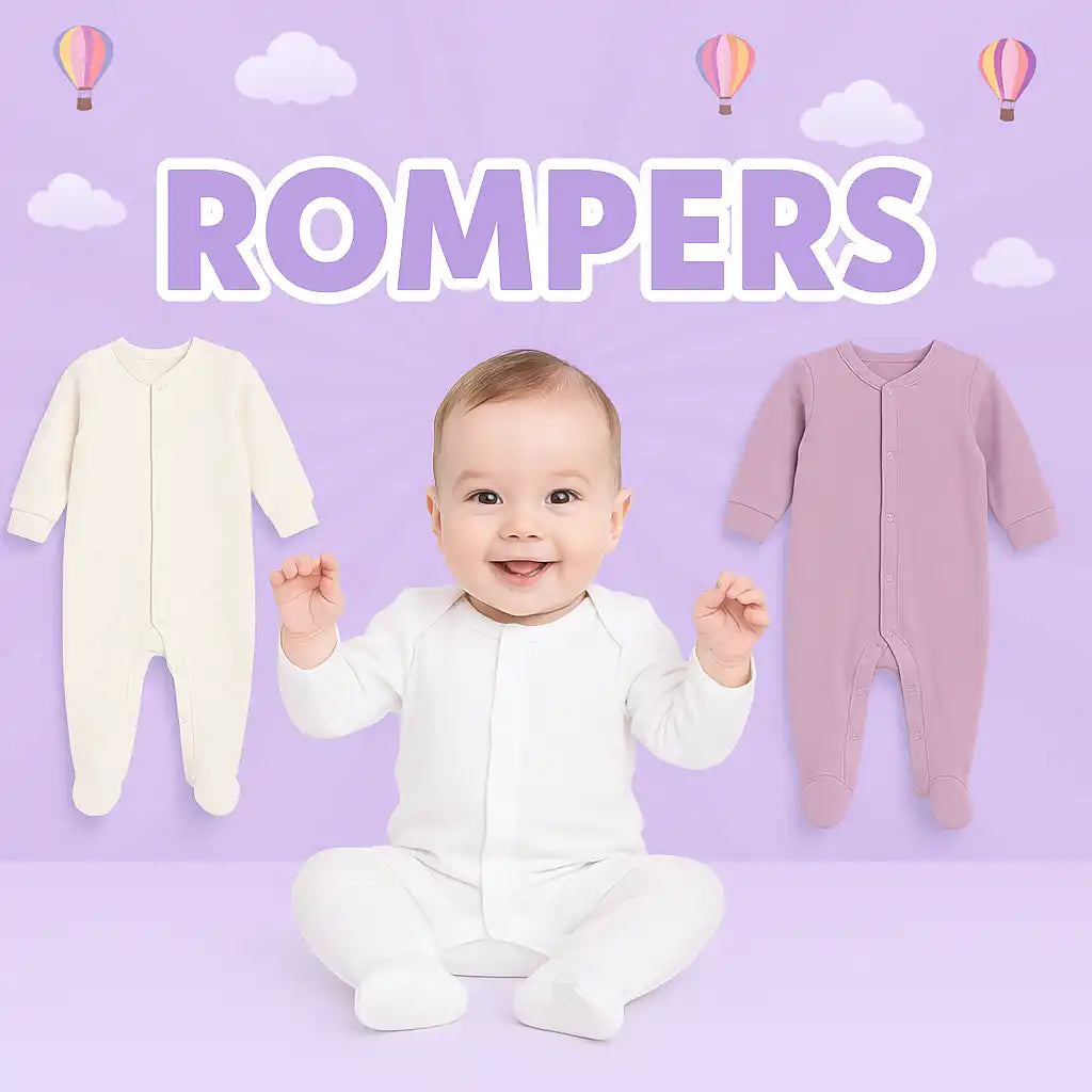 Three soft, long-sleeved baby rompers in white, cream, and lavender.