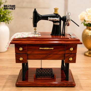 VINTAGE SEWING MACHINE MUSIC BOX WITH WOODEN TABLE DESIGN