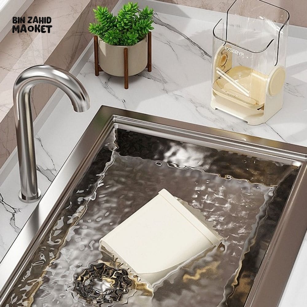 WALL-MOUNTED ROTATING CUTLERY HOLDER WITH DRAIN BASKET