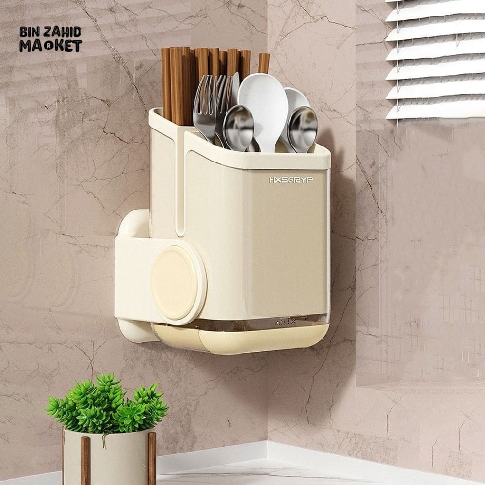 WALL-MOUNTED ROTATING CUTLERY HOLDER WITH DRAIN BASKET