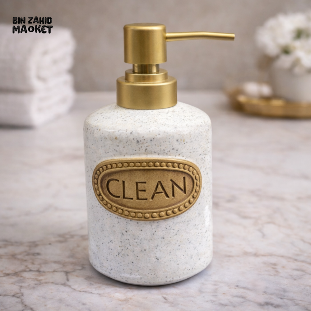 WHITE SPECKLED CERAMIC SOAP DISPENSER WITH GOLD FINISH